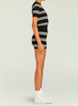 Side view of Ry Knit Top in black with white stripes and short sleeves. thumbnail image 4 of 5