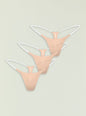 Three peach seamless thong panties with white straps stacked in a vertical display thumbnail image 1 of 5