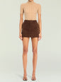 Front view of a model in a beige turtleneck knit top with a brown corduroy mini skirt thumbnail image 2 of 5