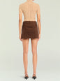 Back view of a model wearing a brown corduroy mini skirt with a beige lace top thumbnail image 5 of 5
