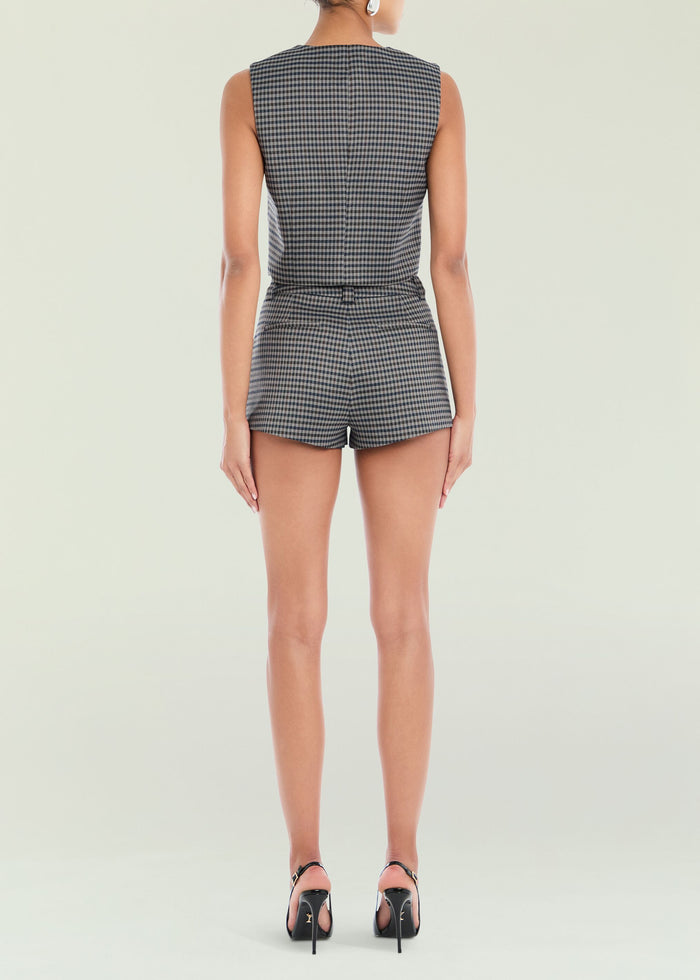 Back view of a grey check pattern sleeveless romper with matching shorts and a defined waist