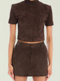 Close up of a brown suede high neck top with short sleeves and visible seam details thumbnail image 1 of 5