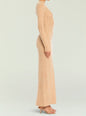 Side view of a peach knit maxi dress on a model with long sleeves and a fitted silhouette. thumbnail image 3 of 5