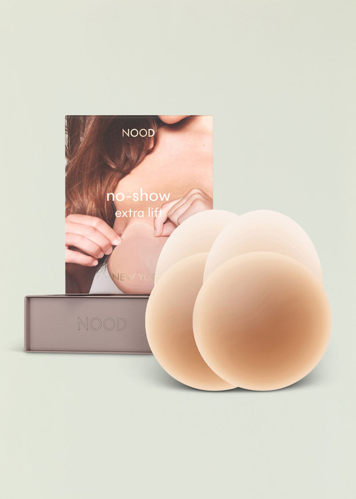 NOOD No-show extra lift nipple covers packaging with beige silicone nipple covers in front