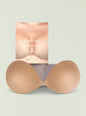 Push up luxe adhesive bra packaging with large beige bra cups arranged around the box thumbnail image 1 of 2