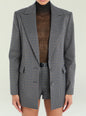 Front view of the Walter blazer in gray and black houndstooth worn with a brown turtleneck. thumbnail image 1 of 5