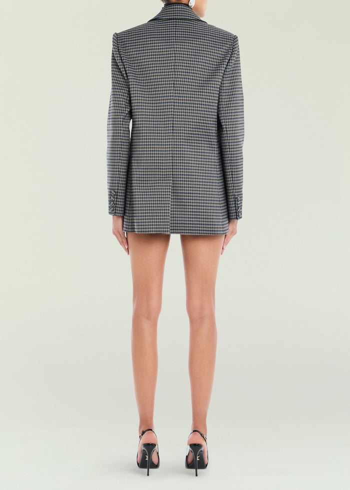 Back view of a grey checked Walter blazer worn by a model