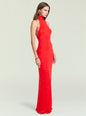 Model in a bold red Lucky Maxi Dress with a high neck and floor length silhouette. thumbnail image 4 of 6