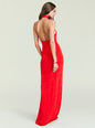 Back view of a model in a full-length red halter neck maxi dress with an open back. thumbnail image 5 of 6