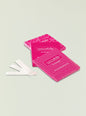 Bright pink matchsticks packaging with a floral pattern on a pale background thumbnail image 1 of 1